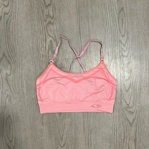 CHAMPION - women’s orange sports bra, size S, used and in great condition